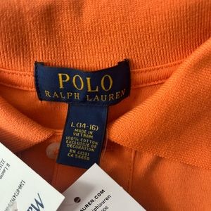 NWT polo shirt 100% cotton. Smoke-free home.